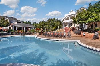 Take a dip in our resort-style swimming pool at Abberly Green Apartment Homes by HHHunt, Mooresville, 28117